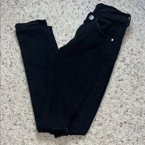 Sleek Black Women's Skinny Distressed Jeans size 2